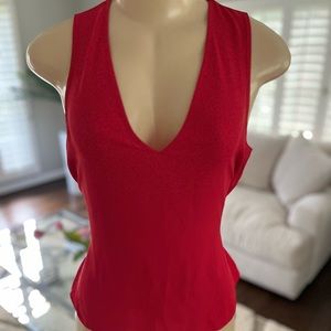 Red top, v neck with peekaboo back